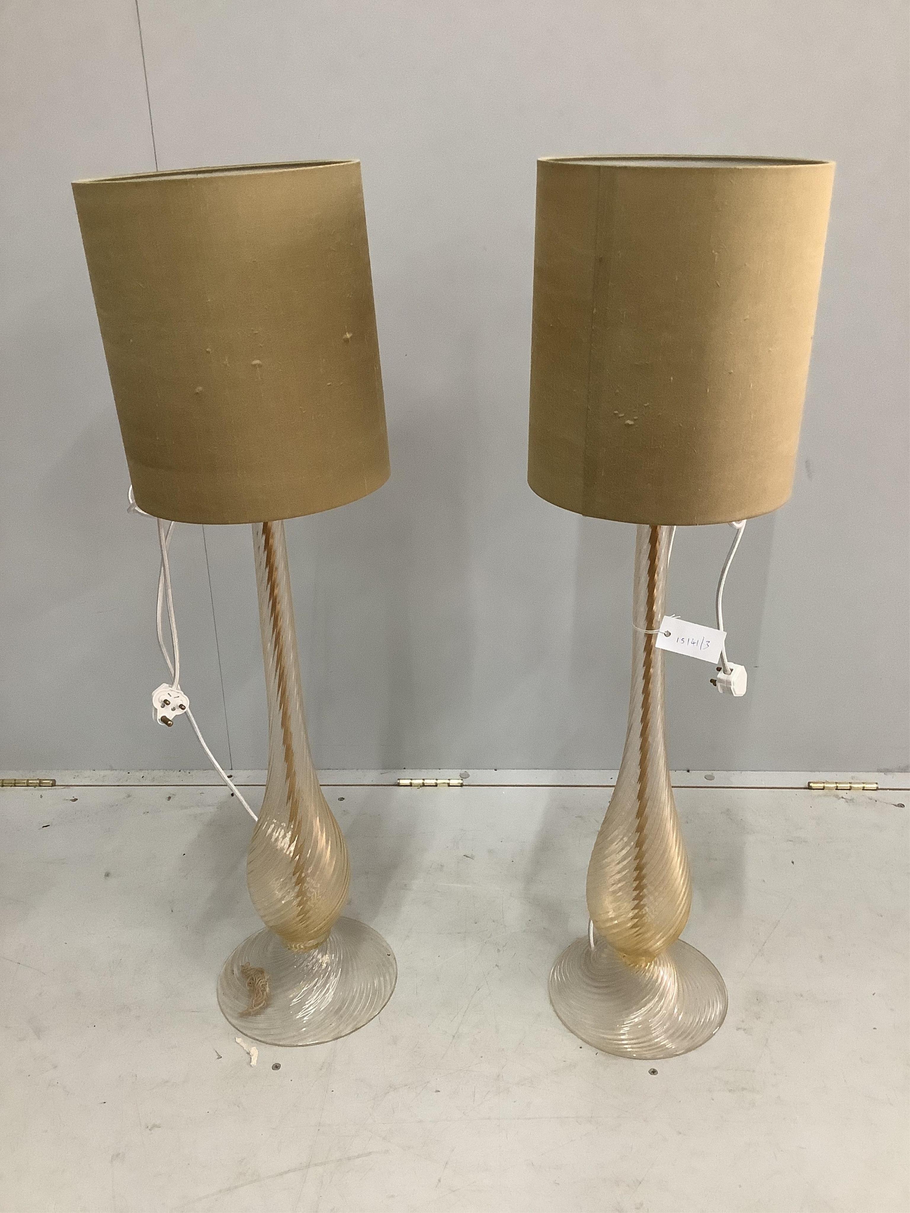 A pair of Venetian Murano style baluster glass table lamps height 96cm. Condition - good, shades fair